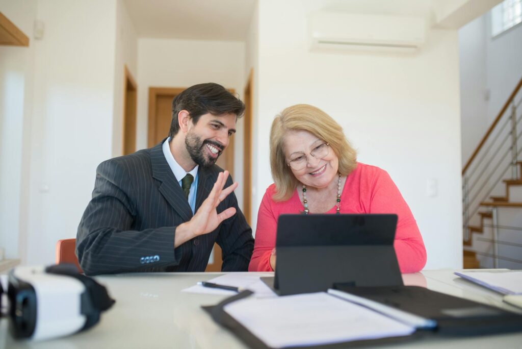 Business consultation with smiling client and consultant.